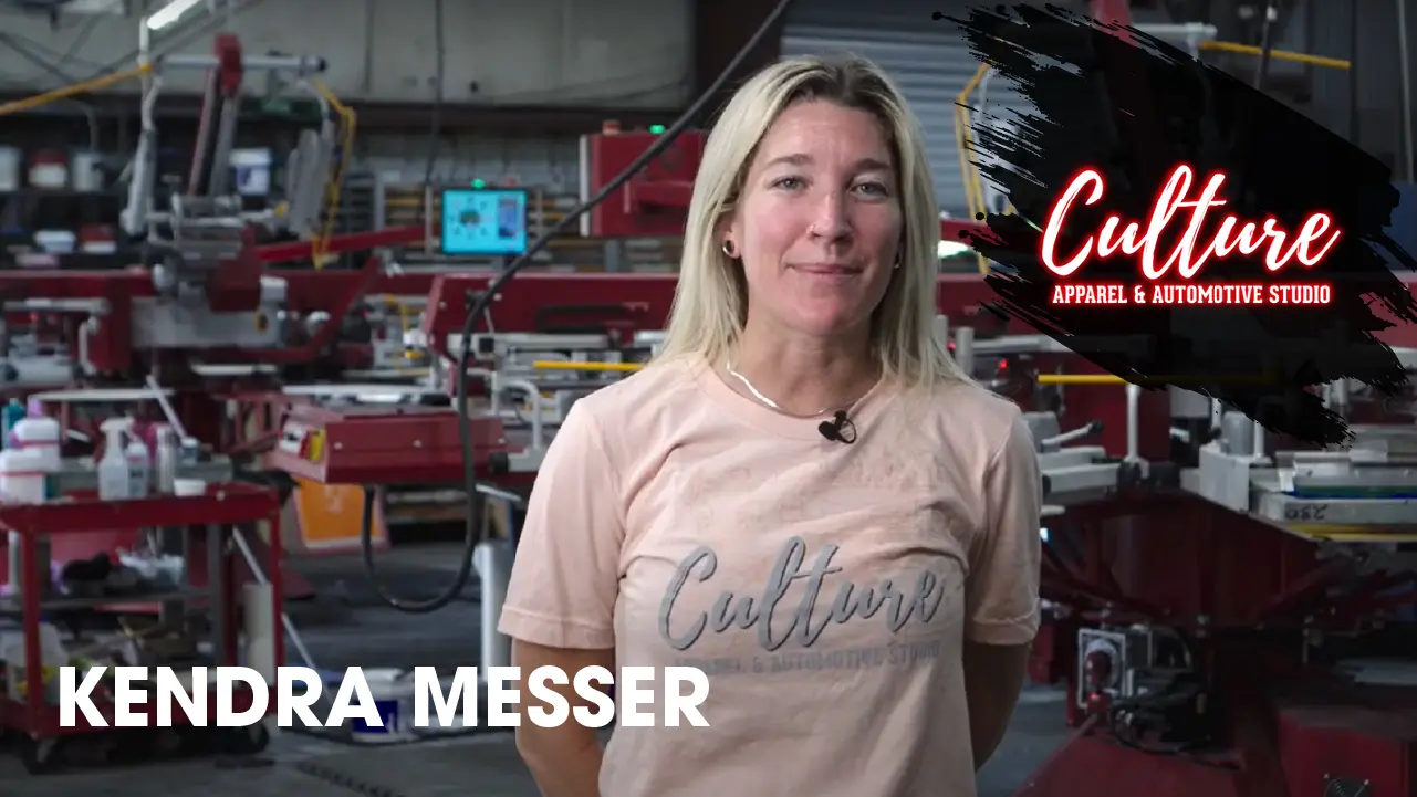Silk screen printing press in action – high-efficiency custom apparel production at Culture Apparel Studio.